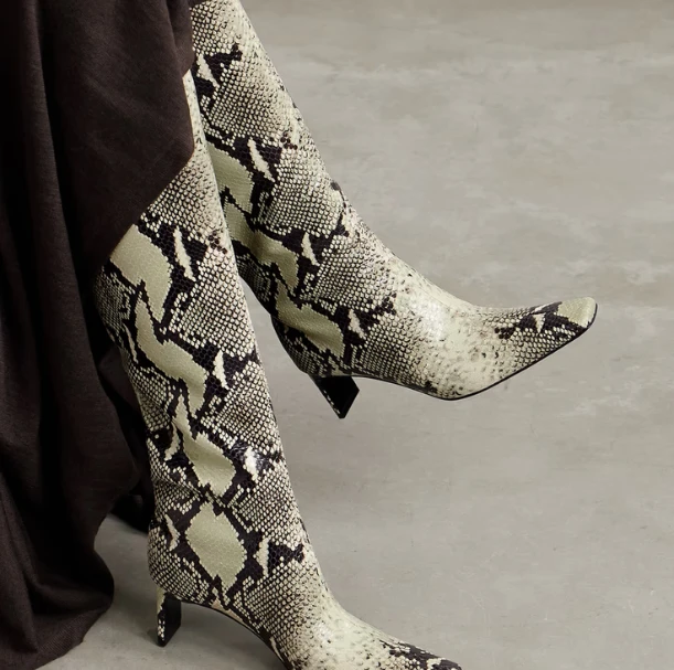 KHAITE Ona Snake-Print Leather Knee Boots | Qué Onda